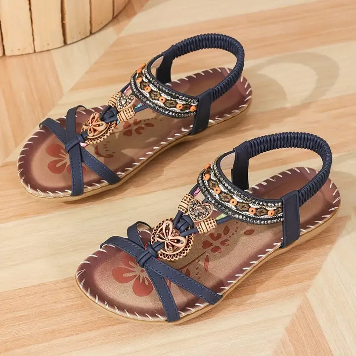 Colella | Elegant sandals decorated with flowers and a rhinestone butterfly