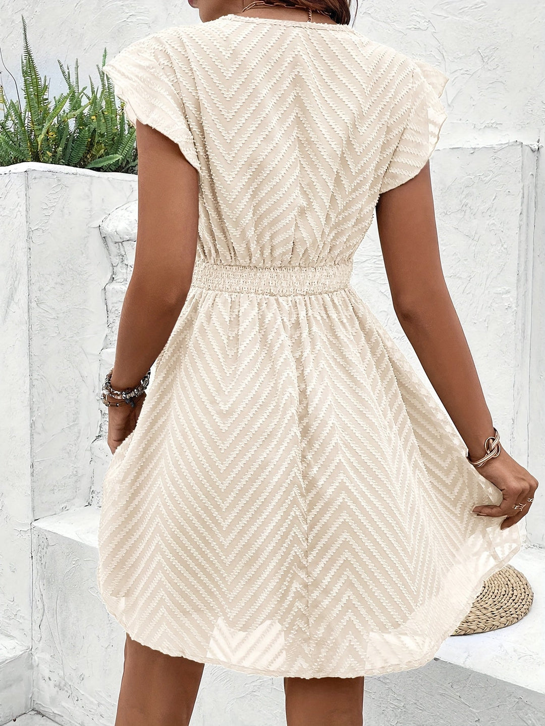 Nayora Sleeveless V-Neck Dress