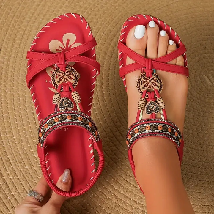 Colella | Elegant sandals decorated with flowers and a rhinestone butterfly