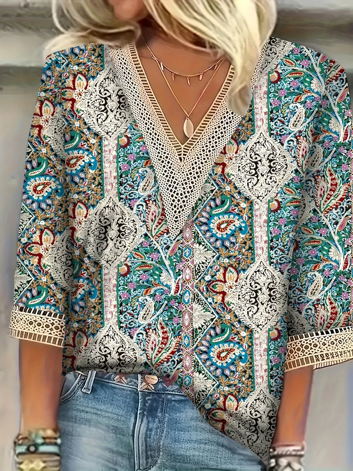 Nela | Elegant blouse with playful print