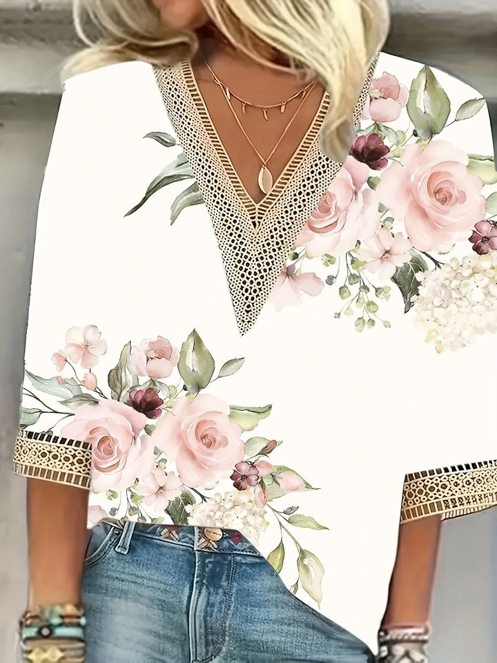 Nela | Elegant blouse with playful print