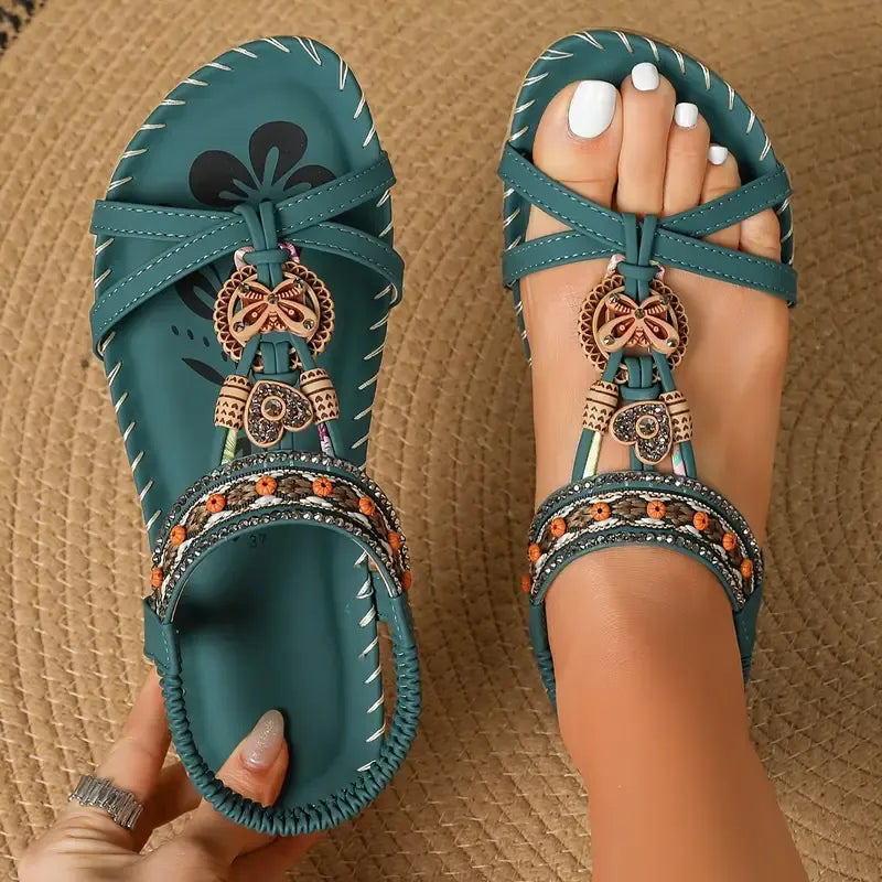 Colella | Elegant sandals decorated with flowers and a rhinestone butterfly