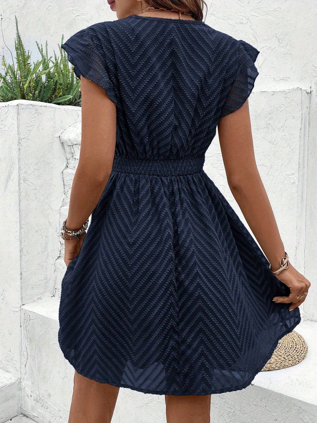 Nayora Sleeveless V-Neck Dress
