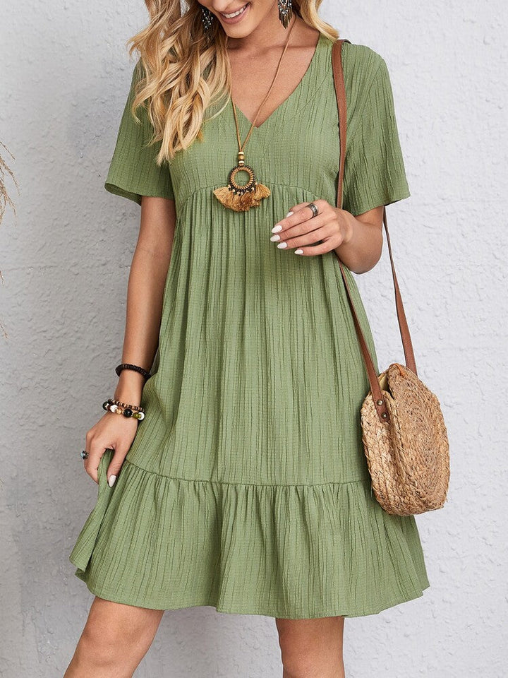 Enora - Elegant dress flattering for the belly